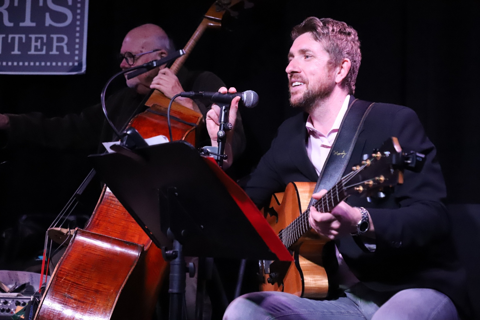 Brandon Bernstein performing live with bassist